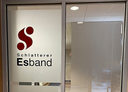 Picture of glass door with esband logo