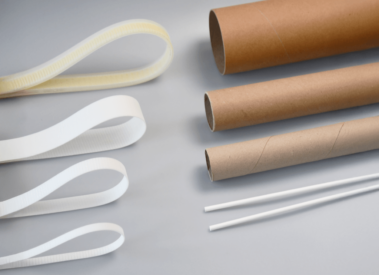 Tube winder belts and cardboard tubes lying on a table