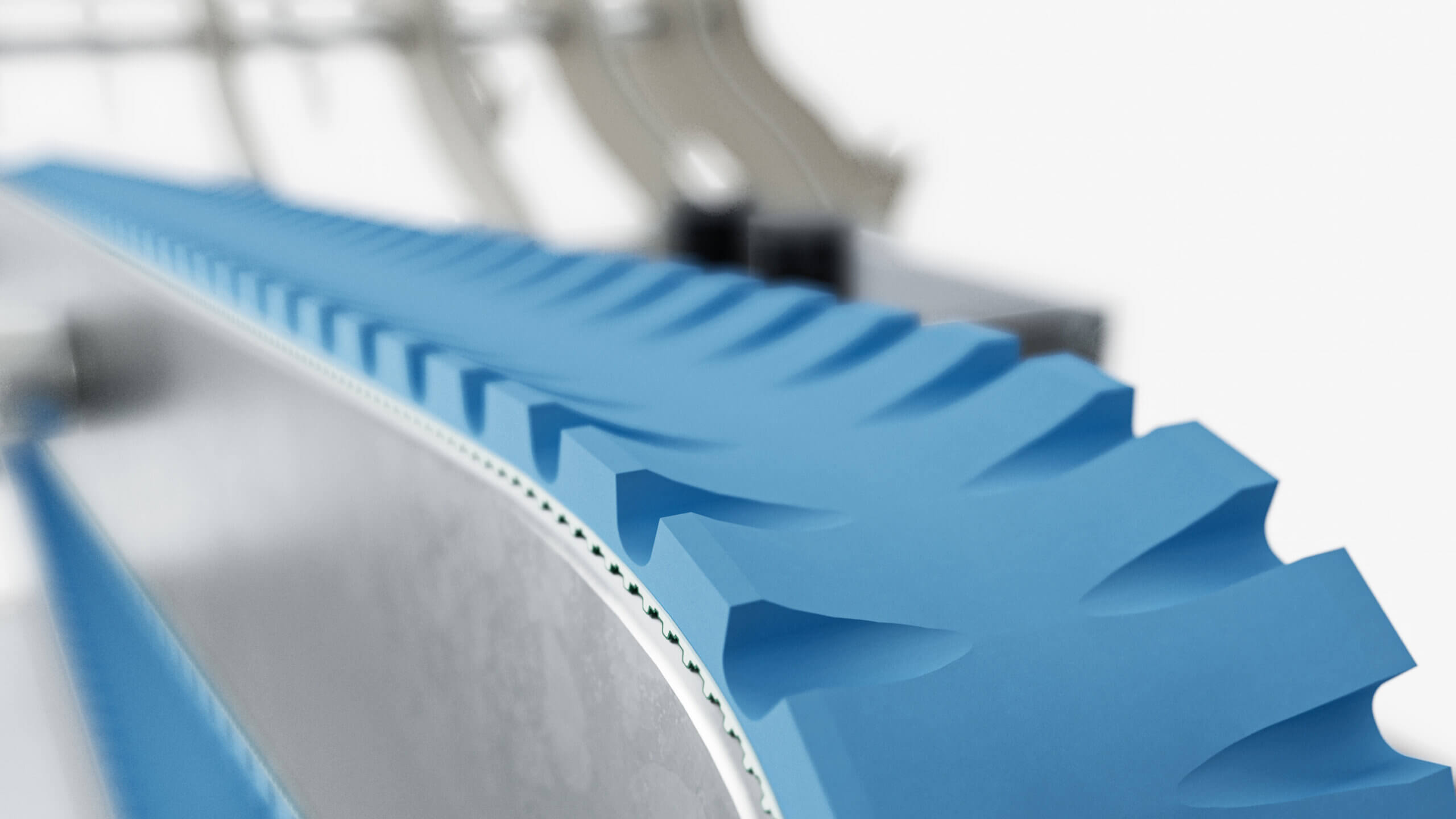 Close up of machine with Esband Sausage Belt in blue on it